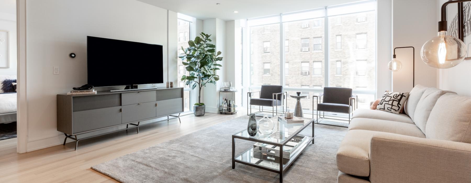 a living room with a tv and a couch